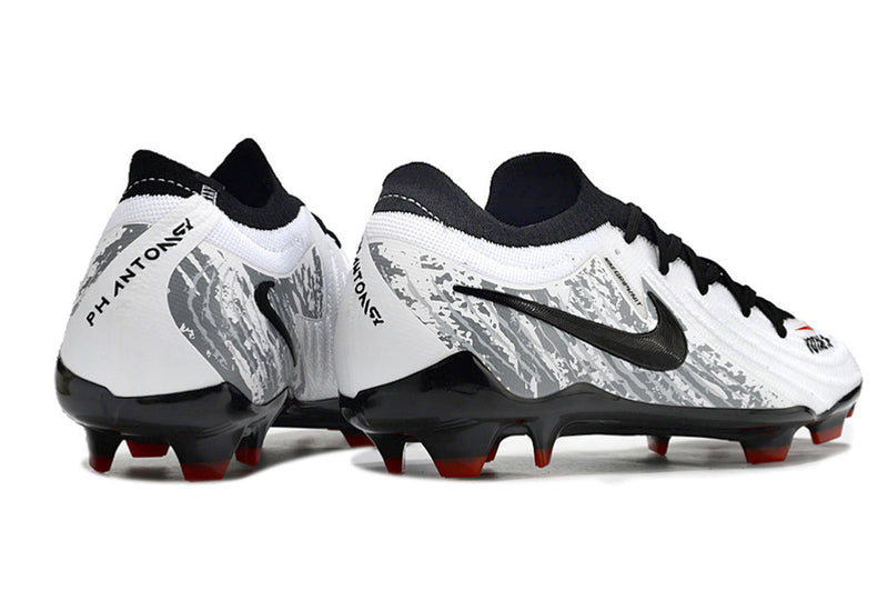 Chuteira Nike Phantom GX II Total 90 FG - Branca, Preta e Vermelha