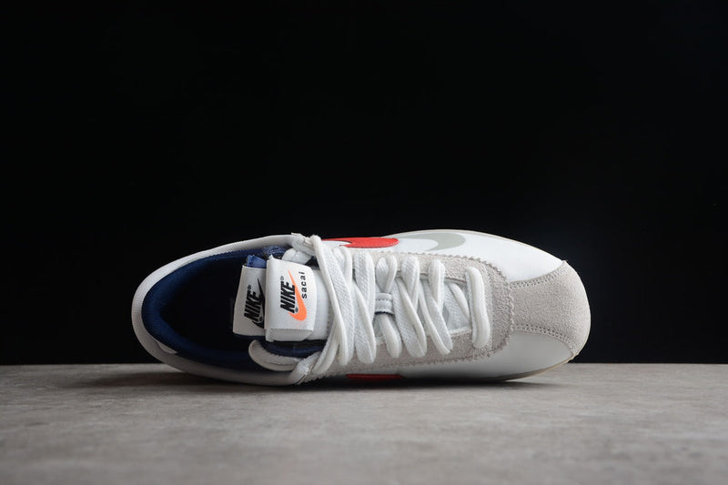 SACAI X NIKE ZOOM CORTEZ WHITE AND UNIVERSITY RED